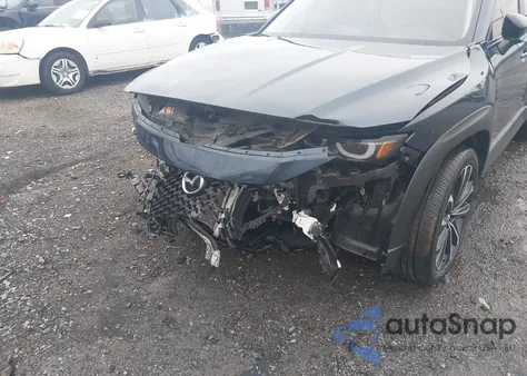 2023 Mazda Cx-50 Meridian z USA, uszkodzony, nr VIN 7MMVABXY0PN124342